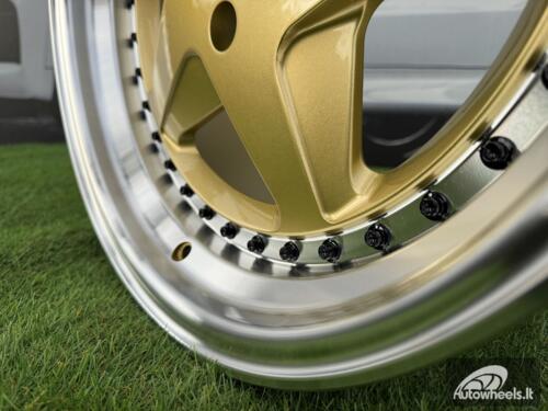 Ratlankis Ferrari 348 Style R17X8.5J 4X100 ET30 73.1 Gold with Diamond cut lip and black rivets wheel